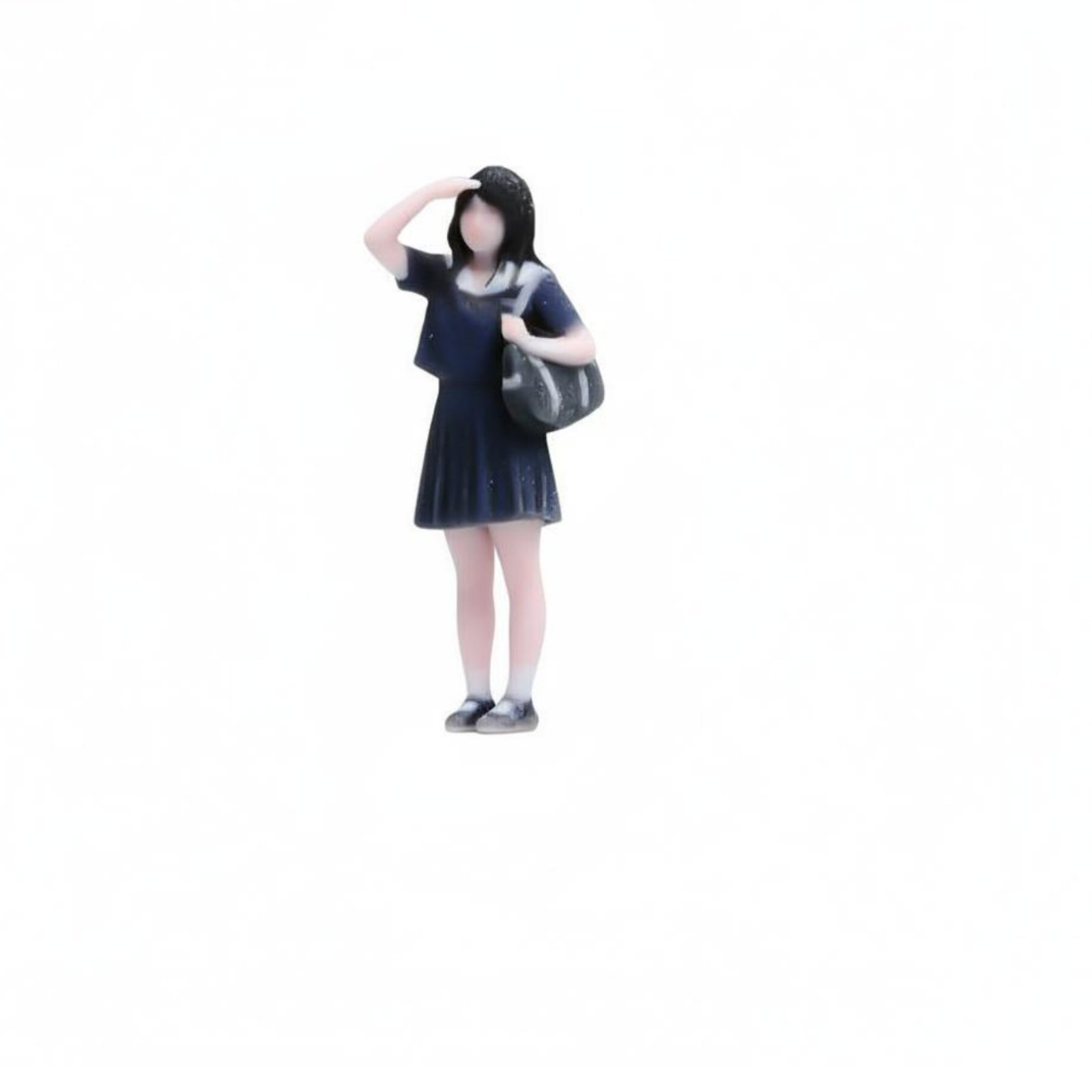 Girl with Backpack Figurine
